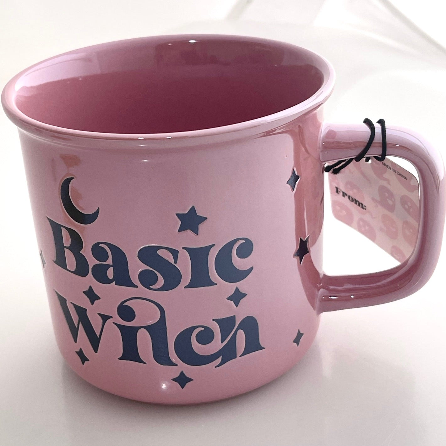 close up of basic witch pink mug