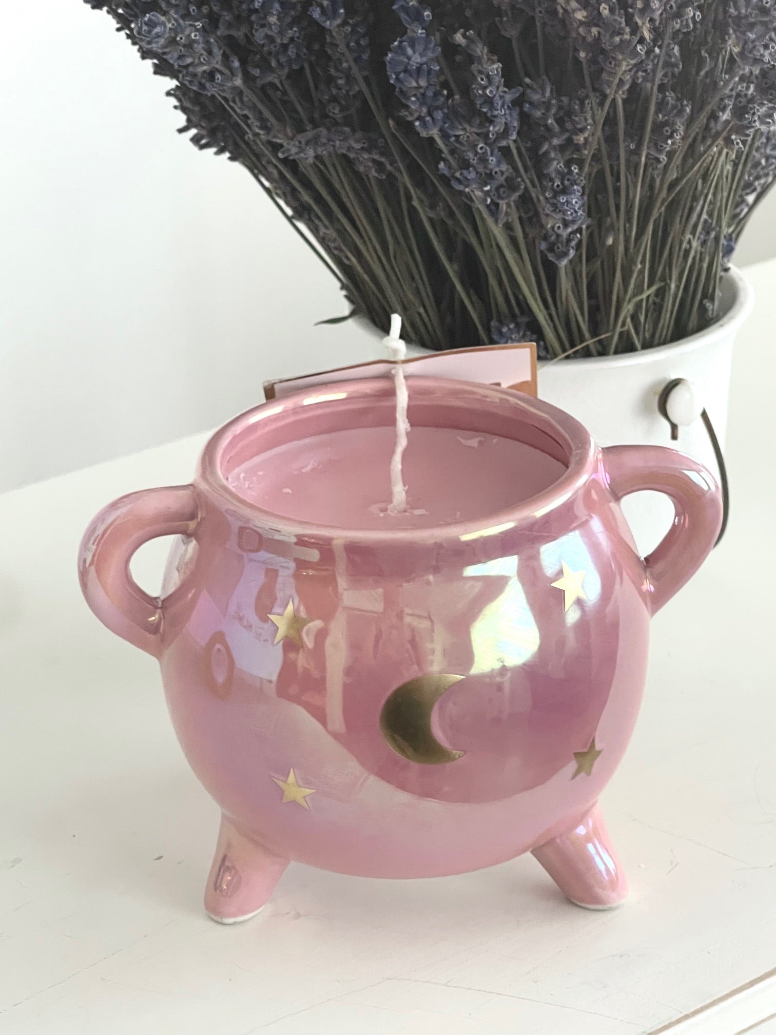 pink cauldron candle with lavender 